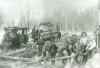 William A. Holmes & Son logging crew after loading a railway car