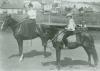 Ten-year-old Willie Kelly and his aunt on horseback.