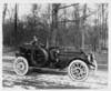 1912 Packard 6 runabout driven by Henry Joy on a snowy, country road
