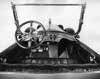 1918 Packard touring car, view from back seat of front steering panel, windshield, and seat