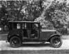 1921-1922 Packard sedan, parked in drive, right side view, doors open to reveal interior