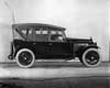 1922 Packard touring car, right side view, top raised, storm curtains in place