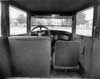 1922-1923 Packard coupe, view of interior from rear seat