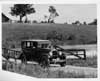 1925 Packard sedan crossing country, wooden bridge