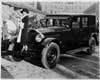 1925-1926 Packard sedan with woman on bumper