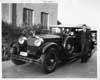 1925-1926 Packard sport model, front view, top raised, Lloyd Hughes standing at driver