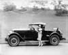 1927 Packard runabout, owner Miss Marjorie Dork standing at driver