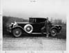 1930 Packard coupe with owner Mr. Lane, foot on running board