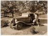 1932 Packard sedan, owner Guy Bonham standing at driver