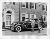 1936 Packard sedan, parked on drive, two men standing at driver