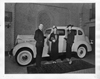 1936 Packard touring sedan inside Packard showroom