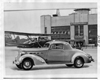 1936 Packard sport coupe parked in front of Detroit City Airport