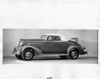 1936 Packard convertible coupe, top raised, rumble seat open