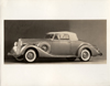 1937 Packard coupe roadster, nine-tenths left side view, top raised