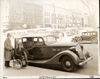 1937 Packard touring sedan, owner Mrs. Martin Johnson at passenger door
