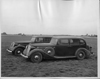 1937 Packards parked on grass at Packard Proving Grounds