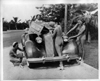 1937 Packard convertible victoria with bathing beauties