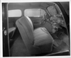 1940 Packard family sedan, view of front interior through passenger side door