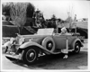 1932 Packard sport phaeton and owner actress Jean Harlow leaning on open driver