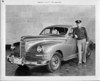 1946-47 Packard touring sedan, owner General Arnold standing at driver