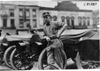 Man leaning against car, 1909 Glidden Tour, Detroit, Mich.