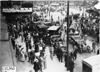 Crowd and cars in front of the Pontchartrain Hotel at start of 1909 Glidden Tour, Detroit, Mich.