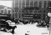 Crowd and trolley in front of the Pontchartrain Hotel at start of 1909 Glidden Tour, Detroit, Mich.