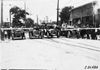 Cars held up at railroad crossing in 1909 Glidden Tour