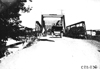 Press car going over Sauk City, Wis. bridge at 1909 Glidden Tour