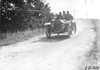 Charles Schofield in Pierce-Arrow car entering Pleasant Valley, Minn. at the 1909 Glidden Tour