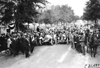 Premier and Moline cars surrounded by crowd in Rochester, Minn., at the 1909 Glidden Tour