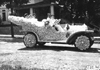McCherney in decorated Wilcox car for parade in Minnesota, at the 1909 Glidden Tour