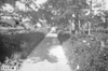 Rural road with houses en route to Minneapolis, Minn., at the 1909 Glidden Tour