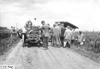 Premier car stopped in middle of road, en route to Minneapolis, Minn., at the 1909 Glidden Tour
