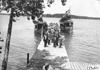 Glidden tourists disembark Plymouth and Puritan excursion boats, at 1909 Glidden Tour
