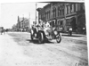 E.O. Hayes in Mason car passing through Faribault, Minn., at 1909 Glidden Tour