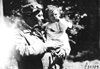 Man and a child at the 1909 Glidden Tour