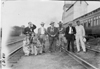 Group of tourists posed on railroad tracks in Kearney, Neb., at 1909 Glidden Tour