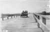 Frank E. Wing in Marmon car crossing the bridge of the North Platte River in Neb., at the 1909 Glidden Tour