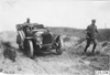 Studebaker car on dirt road in the prairie, at the 1909 Glidden Tour