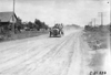Jean Bemb in Chalmers car on rural road at Ft. Morgan, Colo., at 1909 Glidden Tour