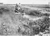 Maxwell car passing through ditch near Aurora, Colo., at 1909 Glidden Tour
