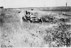 Maxwell car passing through ditch near Aurora, Colo., at 1909 Glidden Tour