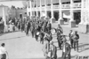 Glidden tourists, led by marching band in Lakeside Park, Denver, Colo., at 1909 Glidden Tour