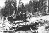 Rapid motor truck driving over logs on mountain road in Colo., at 1909 Glidden Tour