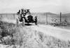 Glidden tourists on rural road in Colo., at 1909 Glidden Tour