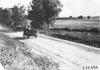 Glidden tourists on rural road in Colo., at 1909 Glidden Tour