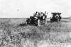 Glidden tourists passing through field, at the 1909 Glidden Tour
