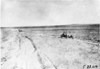 Glidden tourists on rural road in desolate area of Kansas, at 1909 Glidden Tour