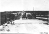 Marmon car approaching wooden bridge near Bunker Hill, Kan., at 1909 Glidden Tour